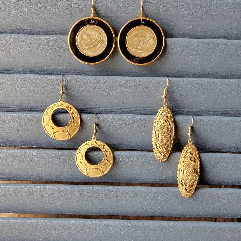 Three pair of gold dangle fashion earrings